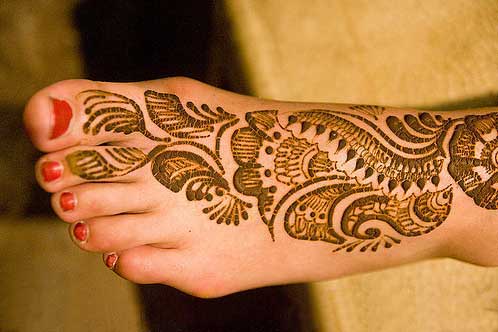 flower tattoo designs on foot. Feet Flower Tattoos Designs
