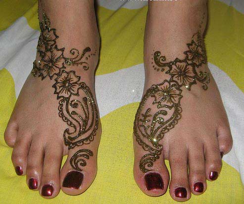 flowers tattoos on feet | Olanessa Buzz