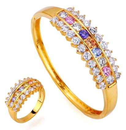 http://www.sheclick.com/wp-content/uploads/2010/11/Colorful-Gold-Ring-Sets-Made-with-Gemstones-for-Brides.jpg