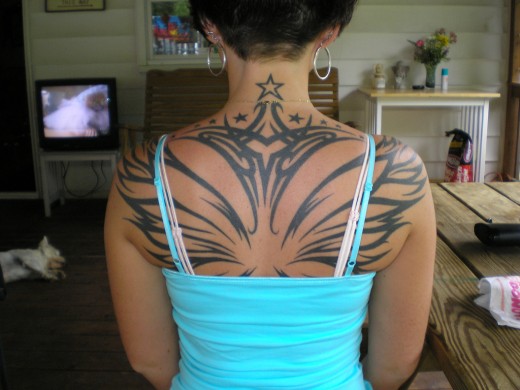 women back tattoos. Best Upper Women Back Tattoo