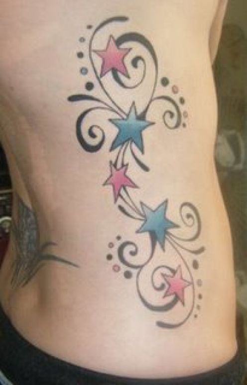 tattoo designs stars. Colorful Stars Rib Tattoo