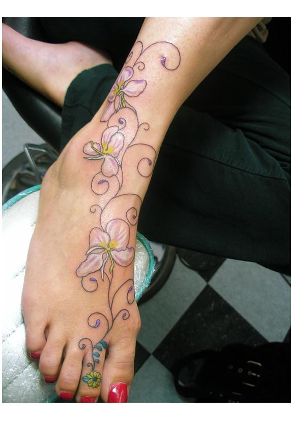 girl tattoos for foot. tattoos on foot designs.
