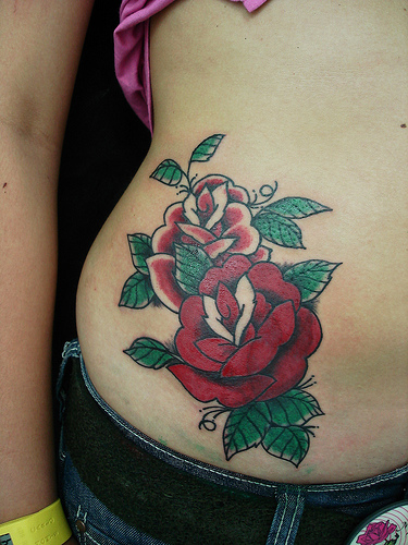 tattoos on your stomach for girls. rose tattoos for girls. black