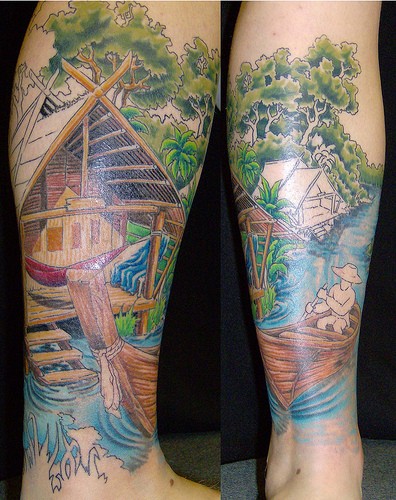 tattoo on girls thigh. Scenic Full Color Leg Tattoo