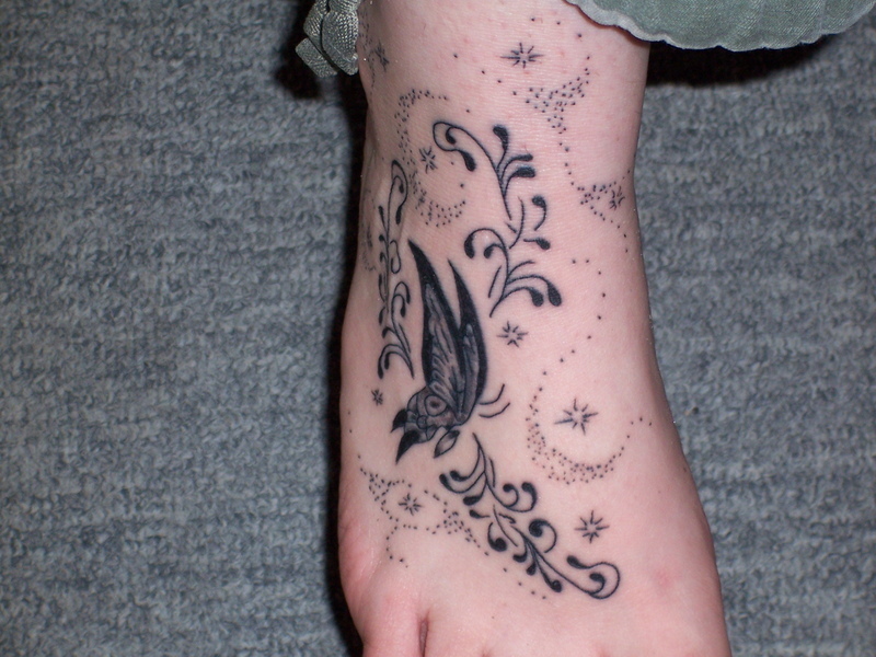 Girl Tattoo Ideas On Foot. 2011 Tattoo Foot Designs for