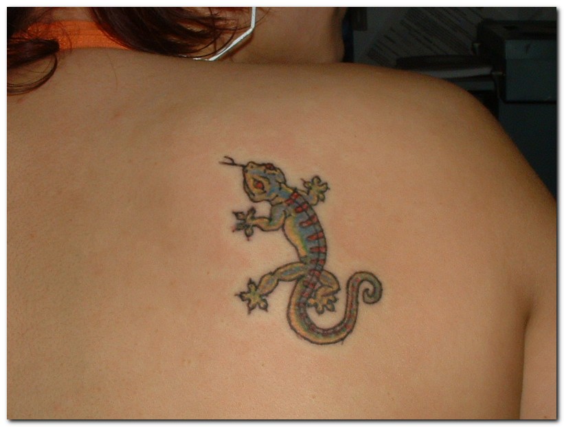 girls tattoo designs. Girls Lizard Tattoo Design