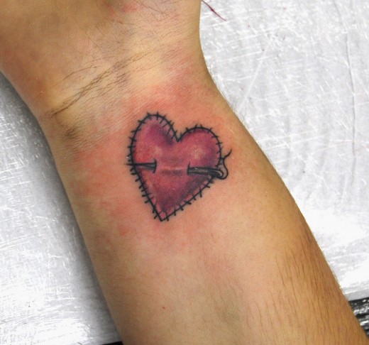 love heart tattoos on foot. love heart tattoos on feet.