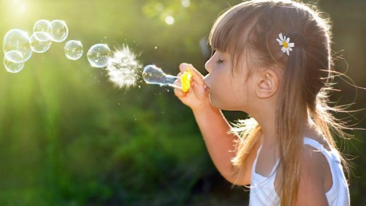 Girl Blowing Bubbles 4K Wallpaper
