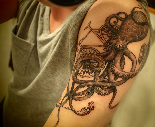 Octopus Trying To Ride A Bike Tattoo Trend